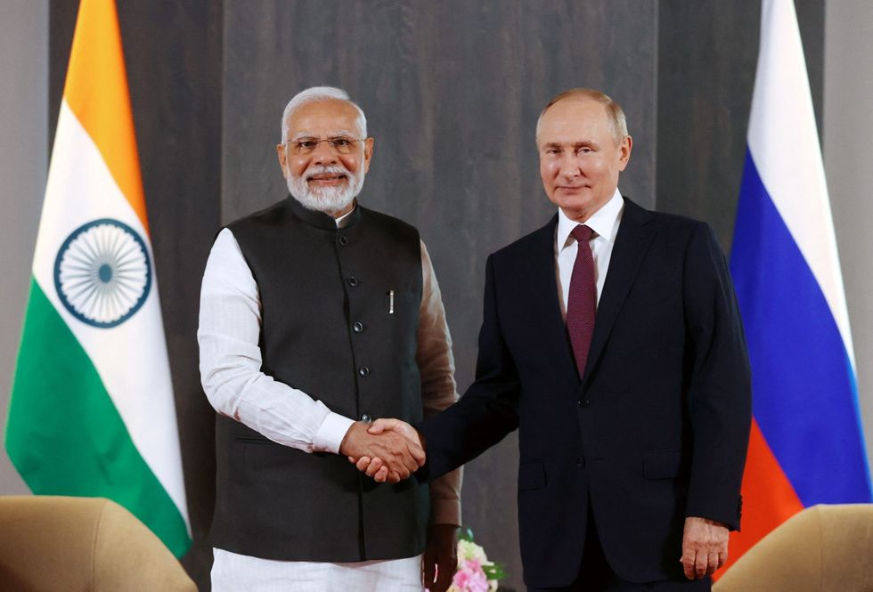 INSET 4 Modi Putin GettyImages 1243276406