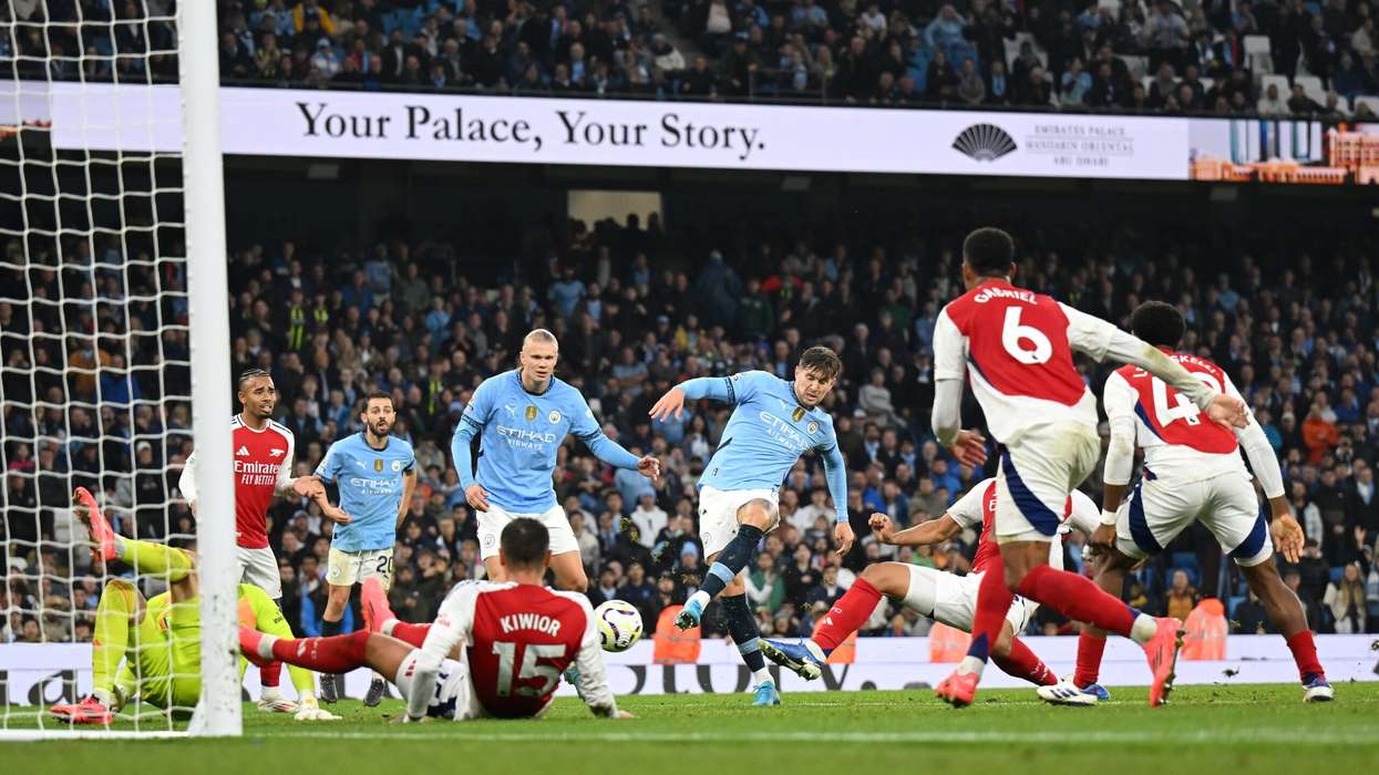 John Stones of Man City scores his team's second goal during the match against Arsenal at Etihad Stadium on September 22. (Photo: Getty Images)