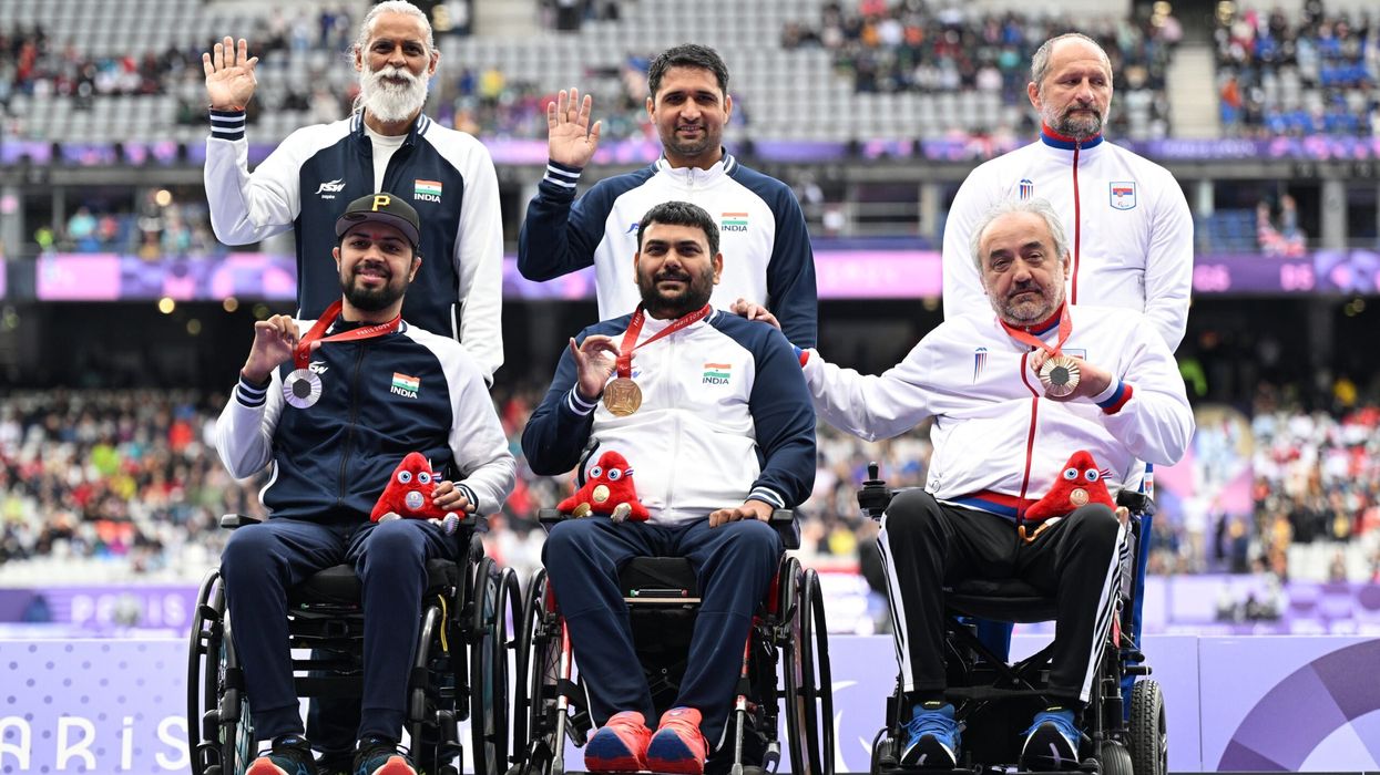 (L-R) Silver medallist, Pranav Soorma of Team India, gold medalist, Dharambir of Team India, and bronze medalist, Zeljko Dimitrijevic of Team Serbia, pose for a photo during the medal ceremony for the Men's Club Throw F51 Final on day eight of the Paris 2024 Summer Paralympic Games on September 5. (Photo: Getty Images)