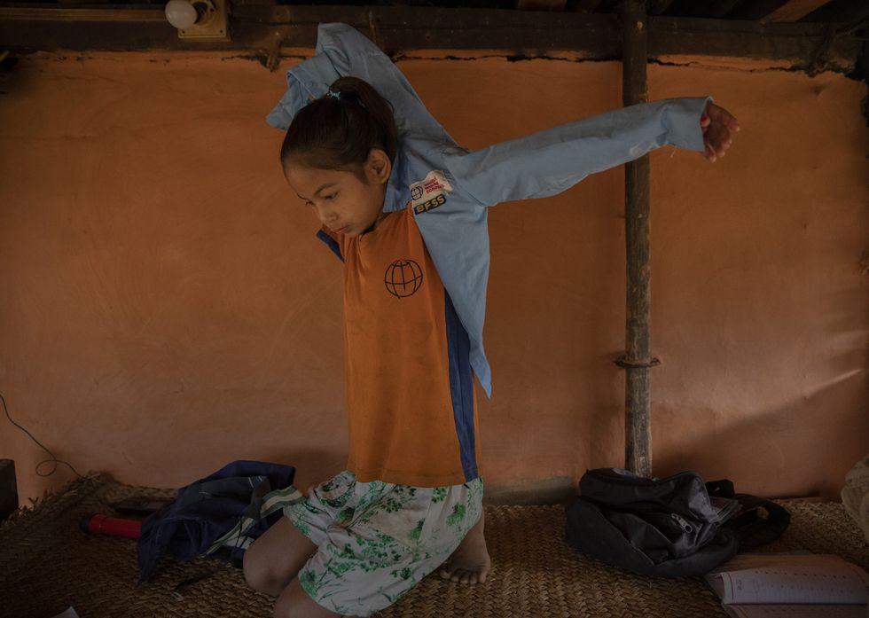 LEAD Education Preeti dresses in her school uniform cred Navesh Chitrakar UWSPATH.