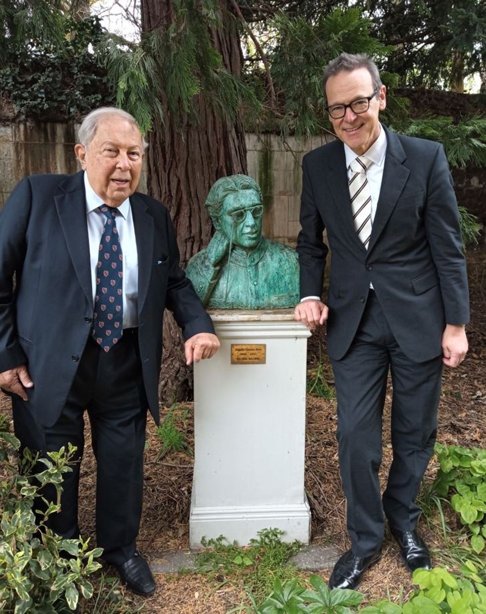 LEAD or INSET Simon McDonald right and Yusuf Hamied with bust of Jagadish Chandra Bose