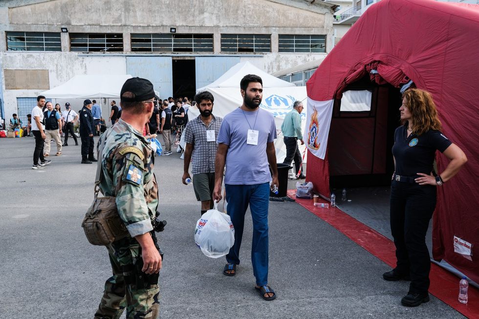 LEAD Pakistan Greece INSET Survivors GettyImages 1258736190