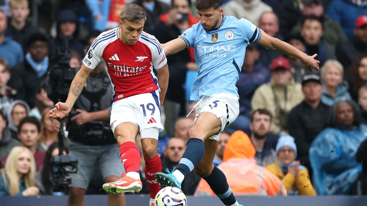 Leandro Trossard of Arsenal battles for possession with Ruben Dias of Manchester City during the Premier League match at Etihad Stadium on September 22, 2024. (Photo: Getty Images)