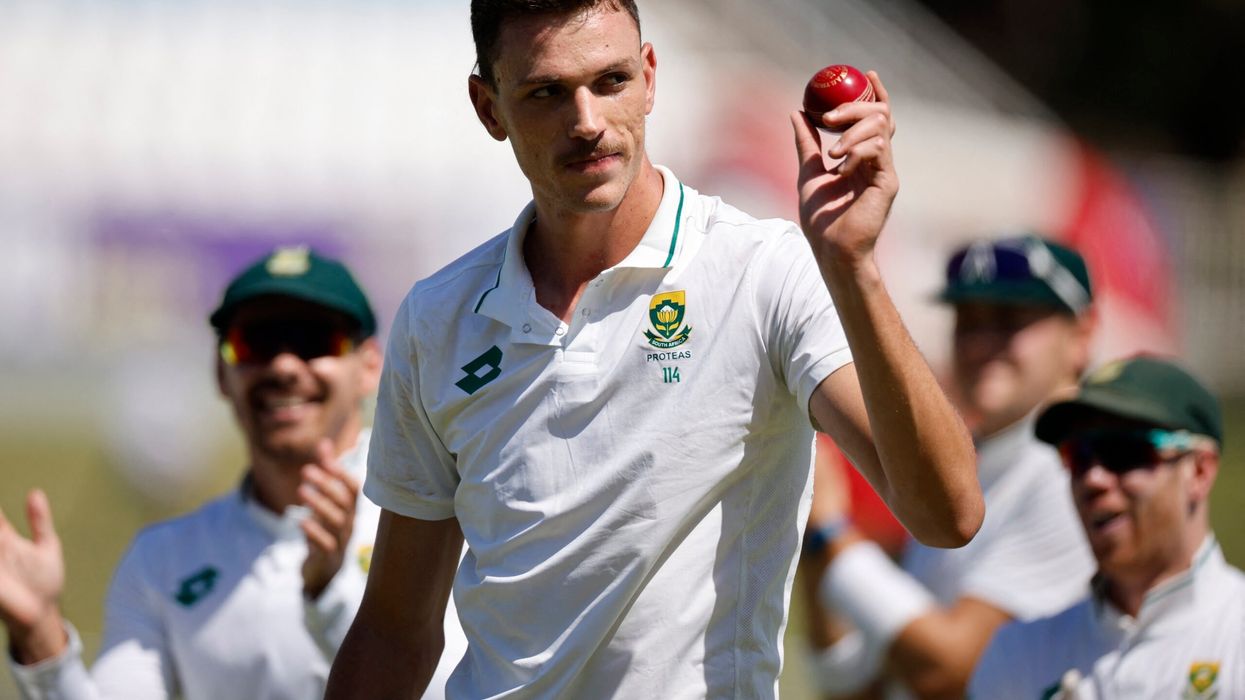 Marco Jansen holds the ball as he celebrates taking 7 wickets in the first innings during the second day of the first Test between South Africa and Sri Lanka at the Kingsmead stadium in Durban on November 28. (Photo: Getty Images)
