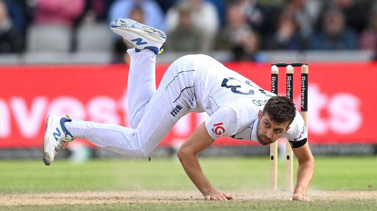Mark Wood falls over after bowling during the 1st Test Match between England and Sri Lanka at Emirates Old Trafford on August 23, 2024 in Manchester. (Photo: Getty Images)