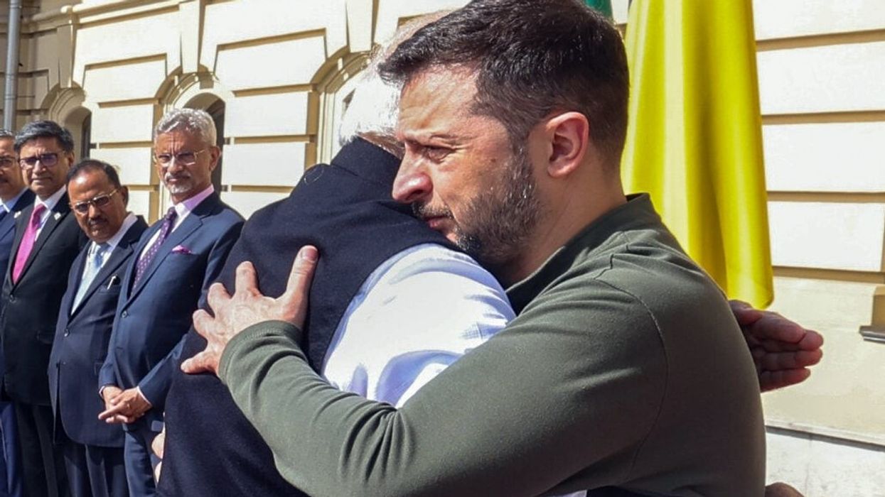 Narendra Modi shares a warm embrace with Ukrainian president Volodymyr Zelenskyy on his arrival at Mariinsky Palace, in Kyiv. (ANI Photo)