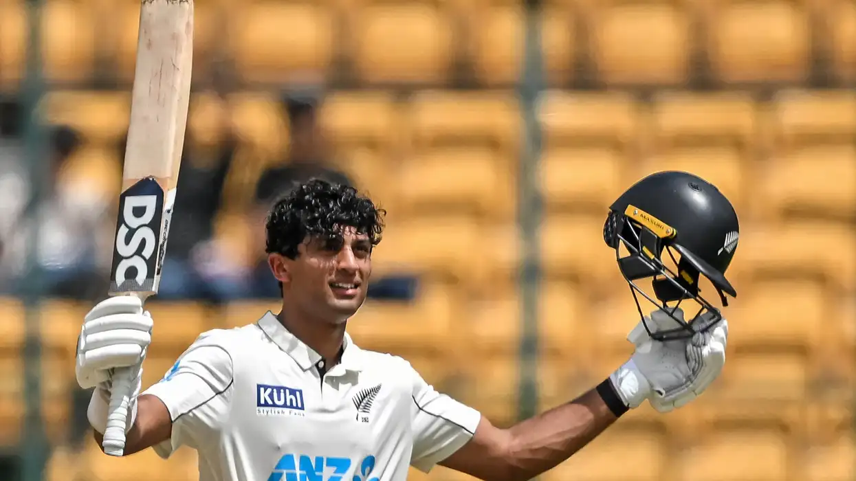 New Zealand's Rachin Ravindra celebrates after scoring a century during the third day of the first Test against India. (Photo: Getty Images)