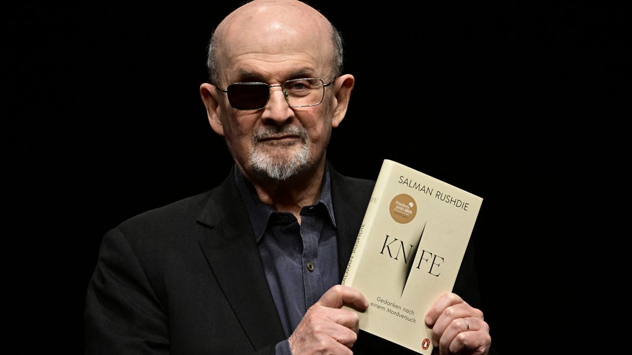 Novelist Salman Rushdie reacts on stage prior to a lecture from his book 'Knife: Meditations After an Attempted Murder', in Berlin on May 16, 2024. (Photo: Getty Images)