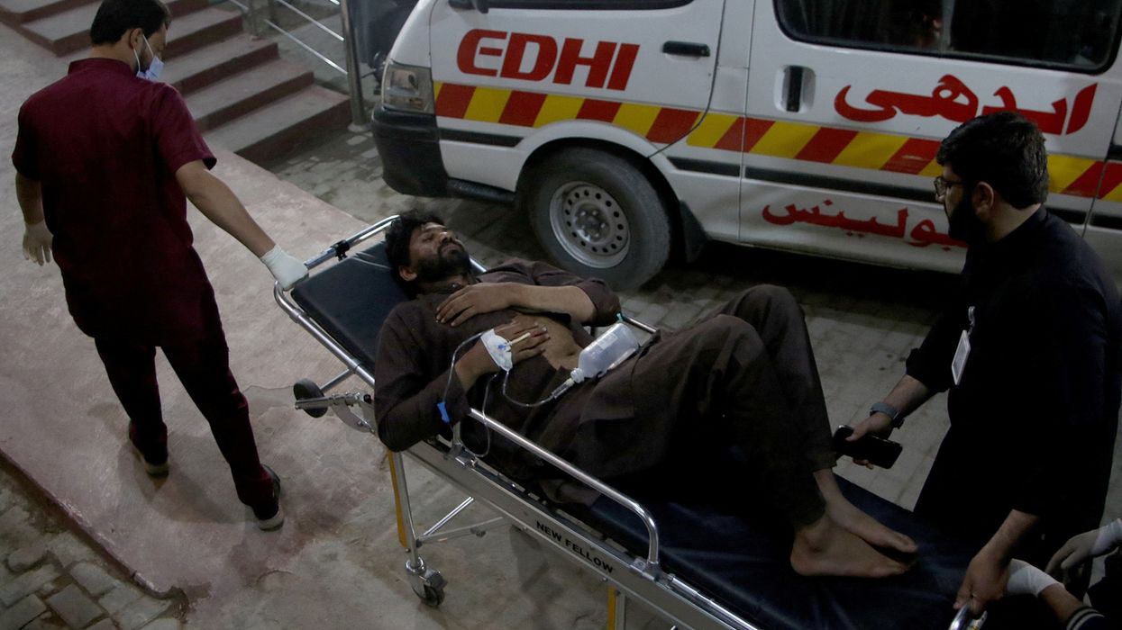 pakistan train siege Reuters