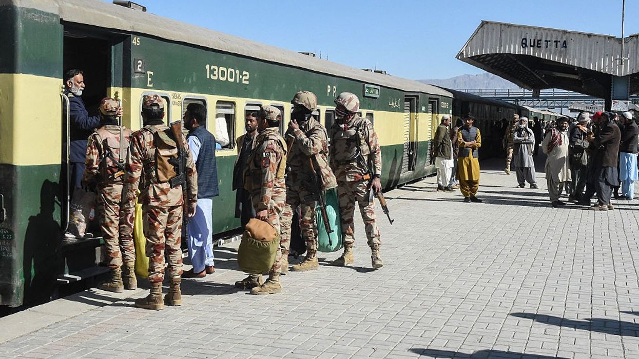 Pakistani Army personnel board the Jaffar Express