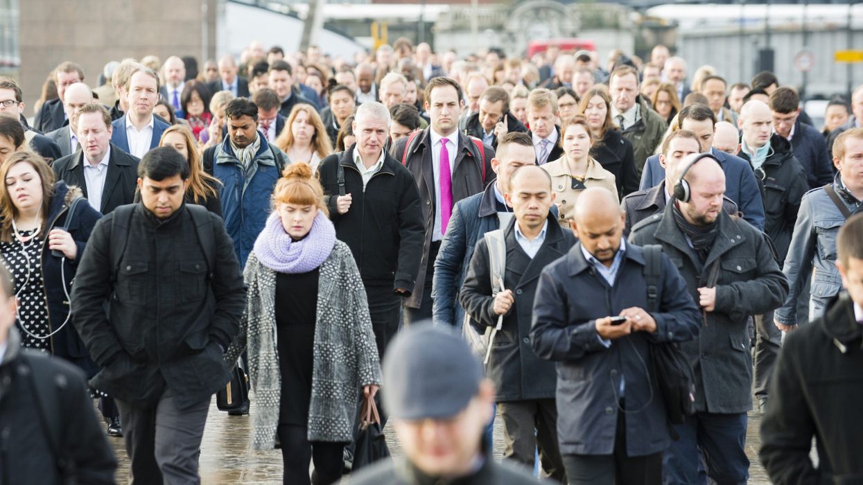 People commuting on London bridge