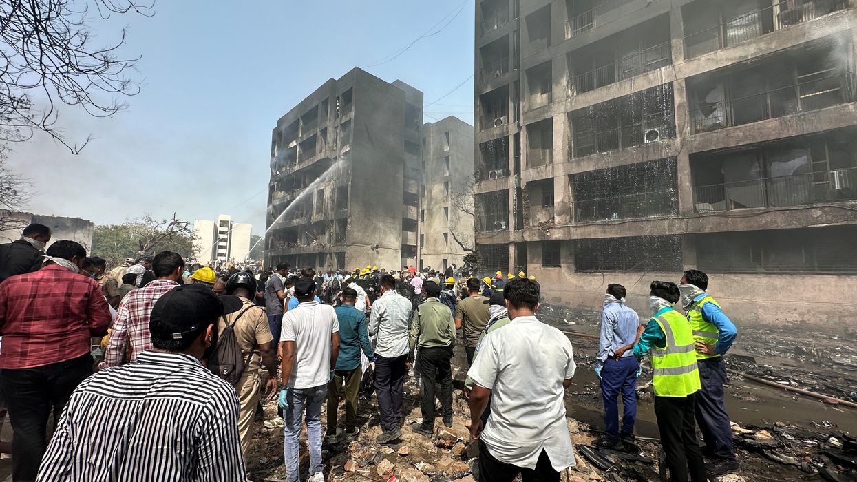 'At least 242 aboard Air India plane that crashed in Ahmedabad'