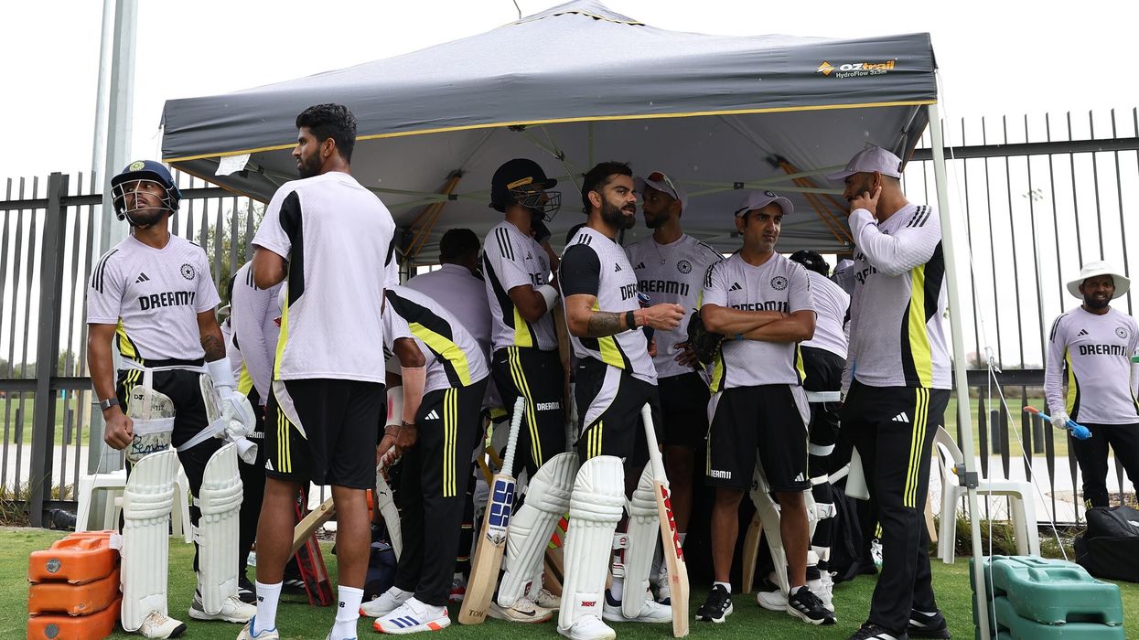 Players take cover under a shelter as rain falls during an India Test squad training session at Optus Stadium on November 19, 2024 in Perth, Australia. (Photo: Getty Images)