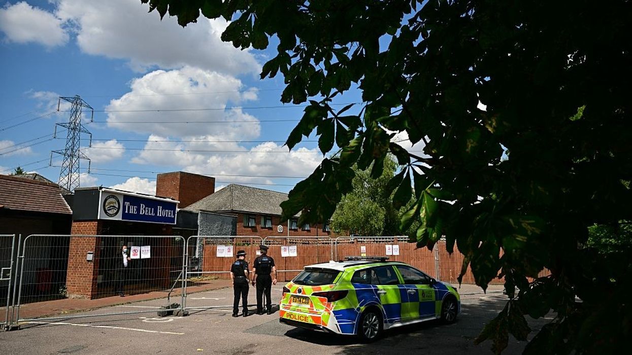 Police hunt anti-migrant protesters after hotel violence