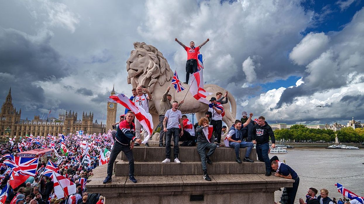 Nearly 150,000 join anti-migrant protest in London as clashes erupt