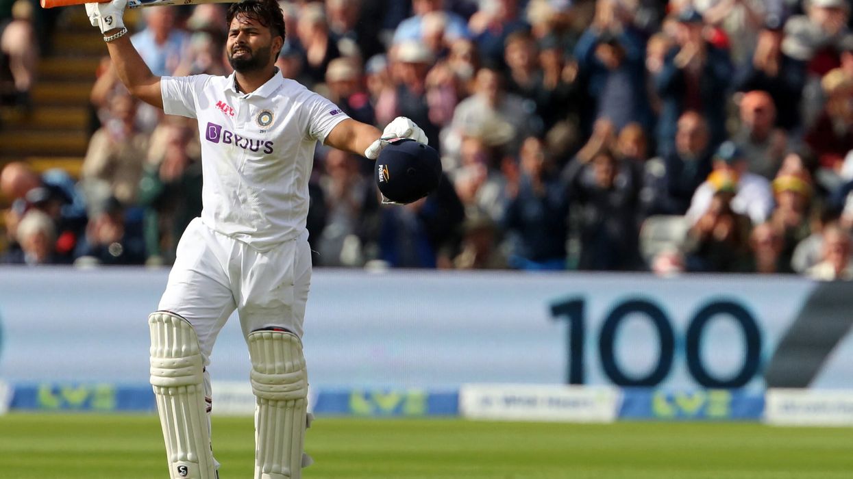 Rishabh Pant celebrates after reaching his century during play on Day 1 of the fifth cricket Test match between England and India at Edgbaston, Birmingham on July 1, 2022. (Photo: Getty Images)