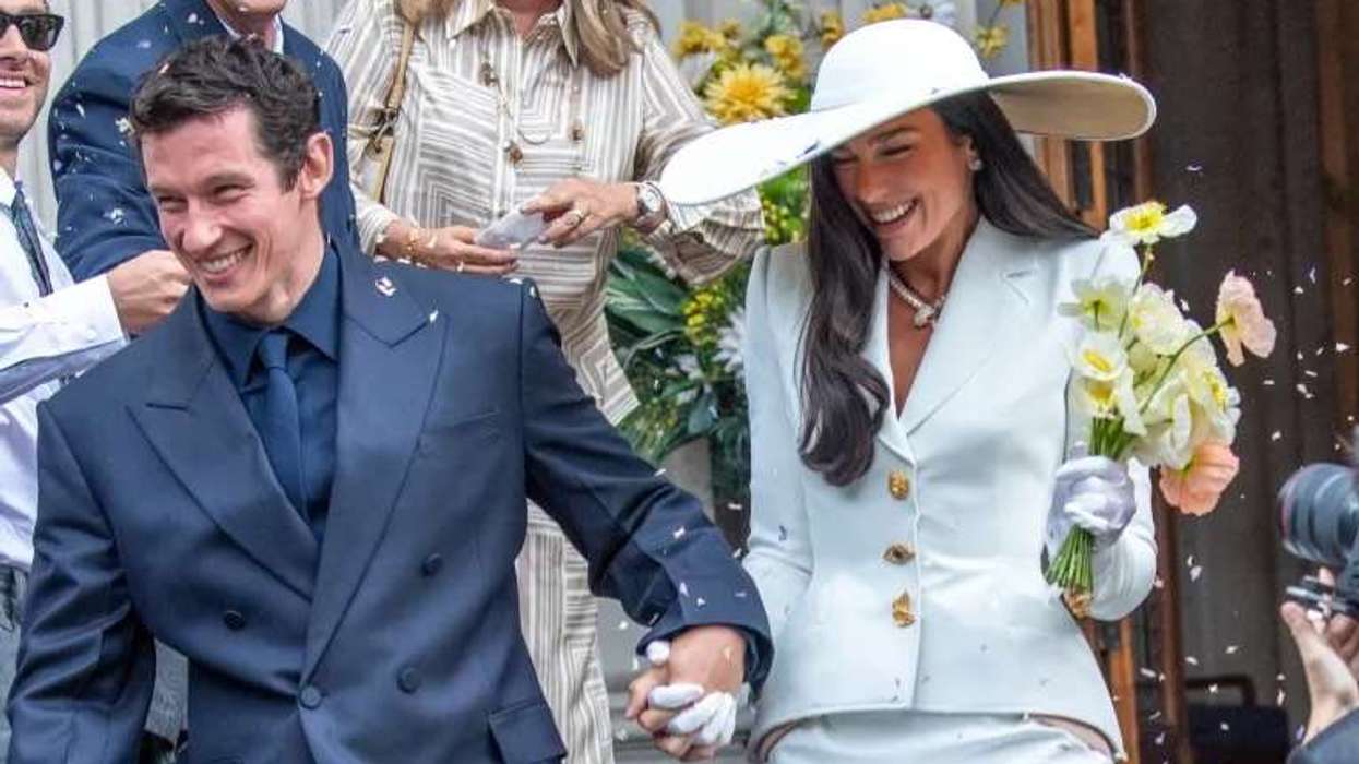 Dua Lipa swaps traditional wedding gown for Schiaparelli suit as she marries Callum Turner in London