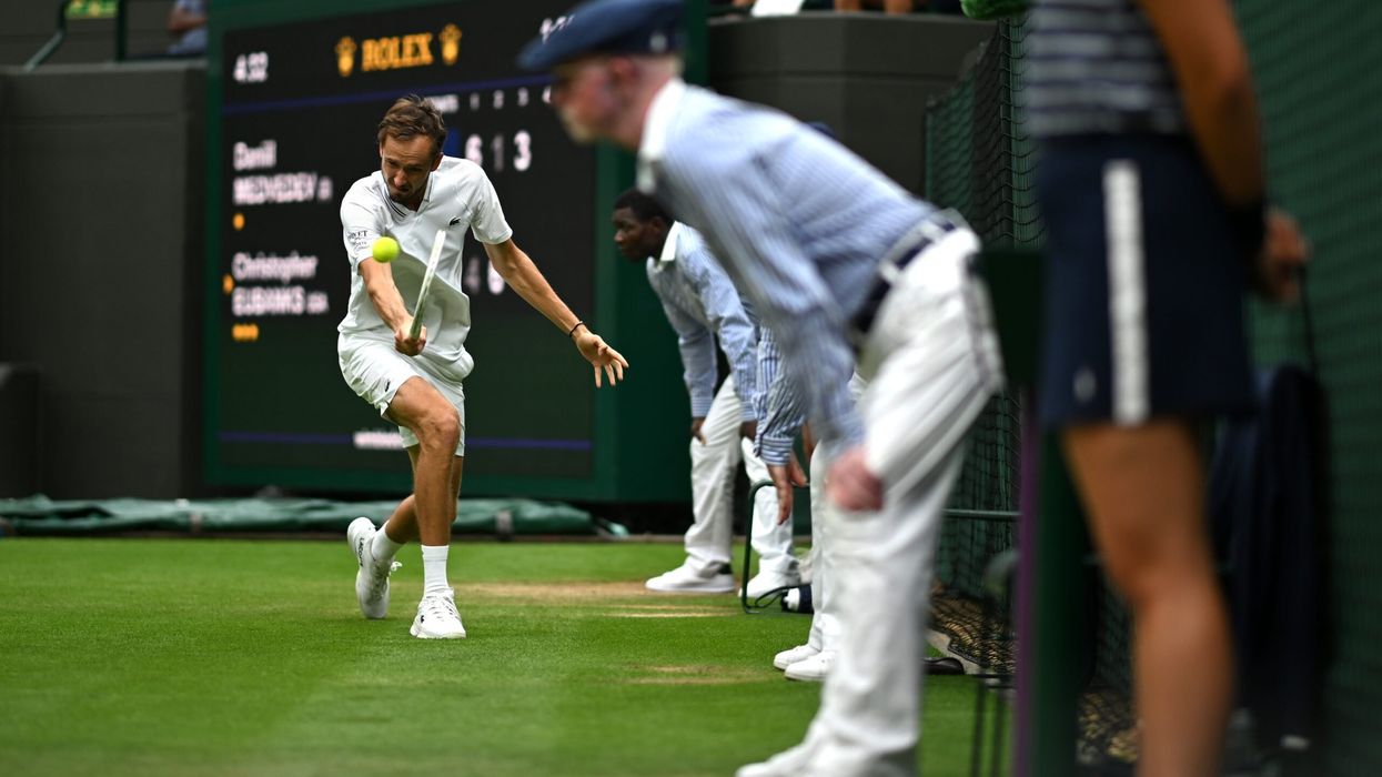 This decision marks a significant change for the grass-court tournament, which has long featured human line judges as part of its tradition. (Photo: Getty Images)