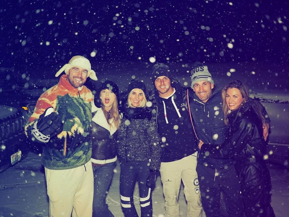 Travis Kelce and Taylor Swift during their snowy vacation