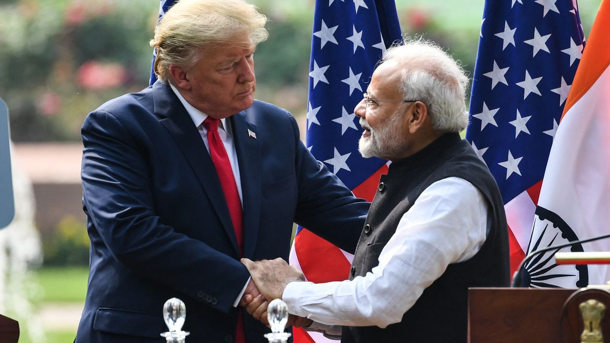 Trump shakes hands with Modi