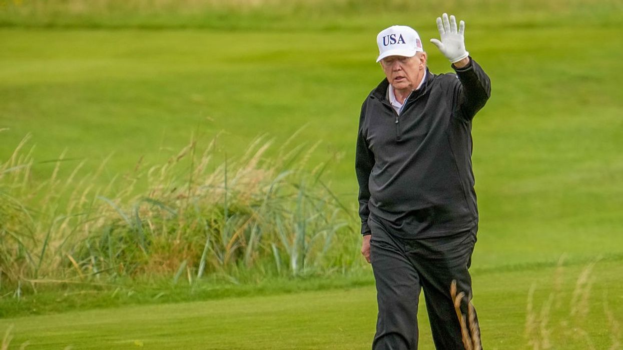 Trump plays golf in Scotland amid tight security, protests