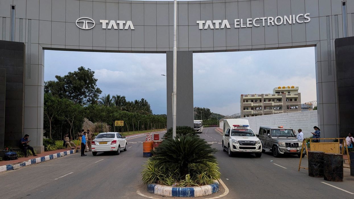 Vehicles pass through the security check at the entrance of Tata Electronics Plant in southern India which makes Apple iPhone component in Hosur, Tamil Nadu. (Photo: Reuters)