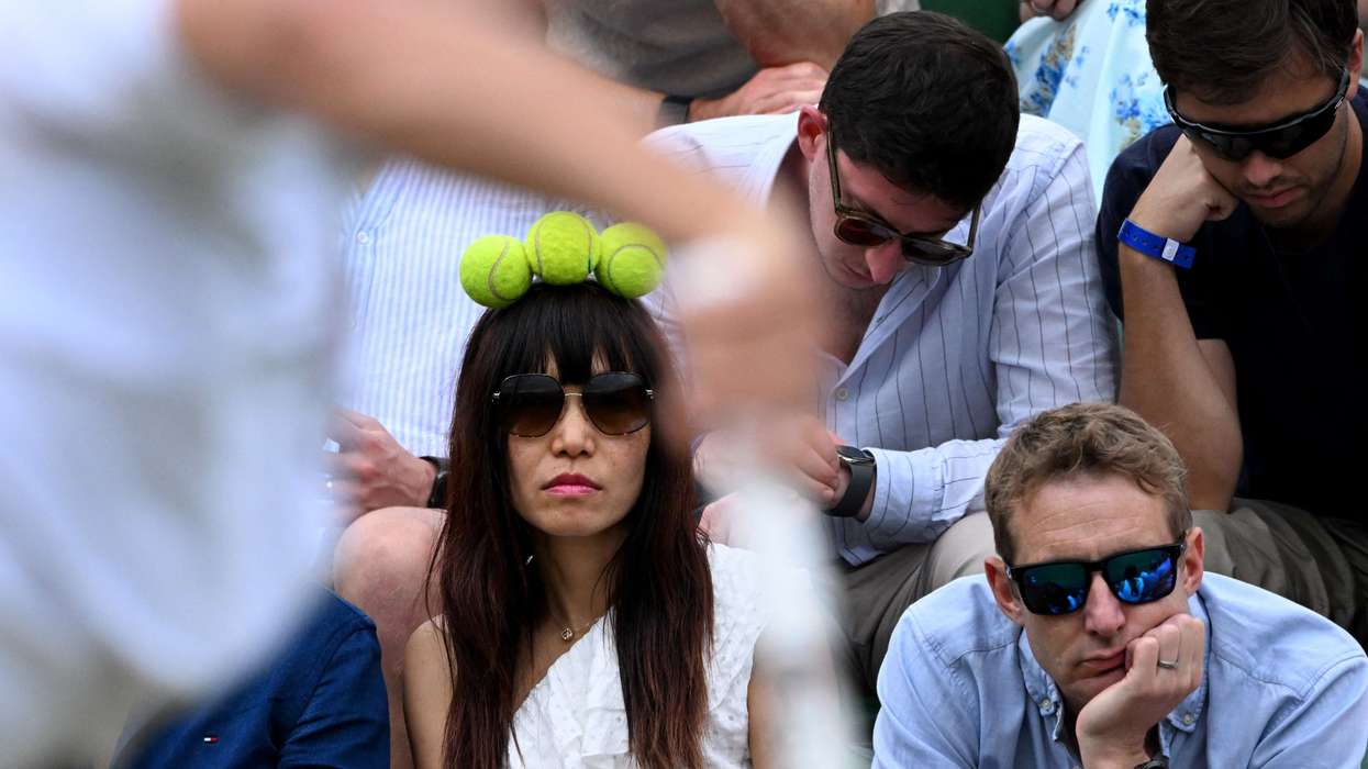 Wimbledon says no to big screens but fans still watch the FIFA World Cup