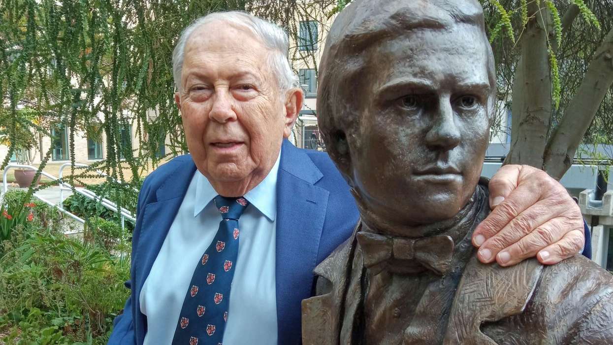 Yusuf Hamied with Charles Darwin young statue
