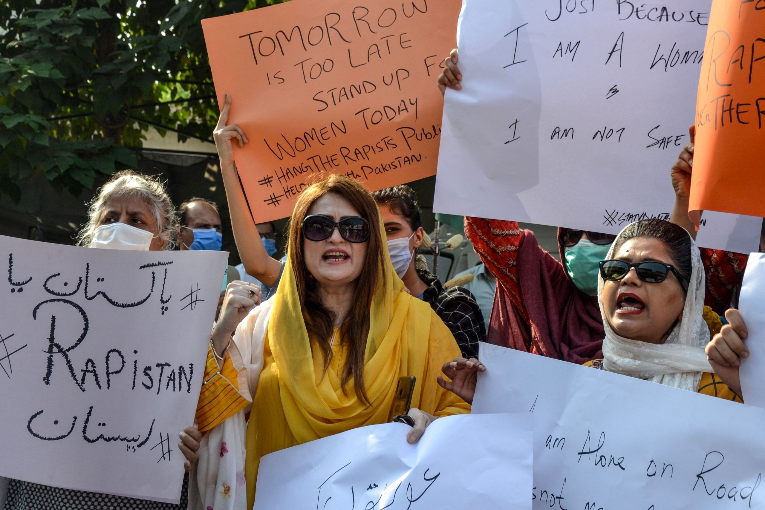 People march during a protest against an alleged gang rape of a woman, in Peshawar on September 12, 2020. (Photo by ABDUL MAJEED/AFP via Getty Images)