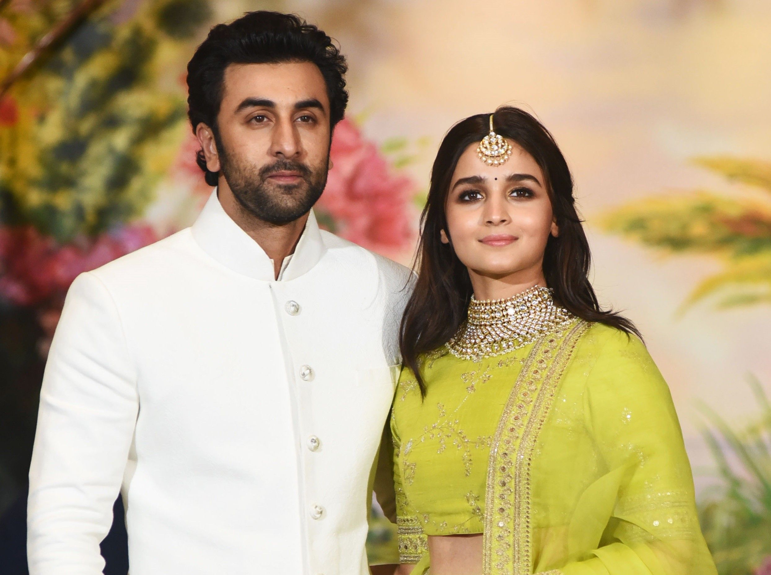 Ranbir Kapoor (L) and Alia Bhatt (Photo credit: SUJIT JAISWAL/AFP via Getty Images)