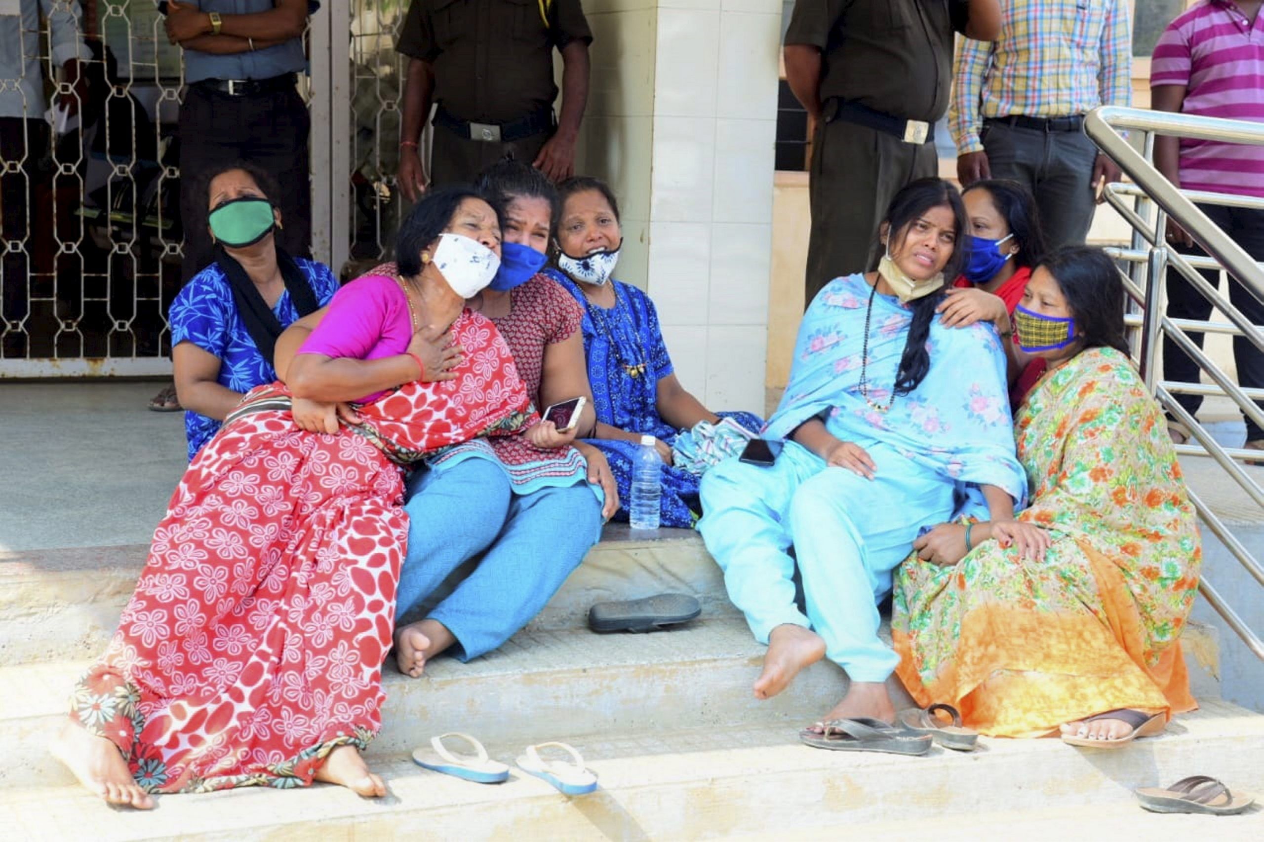 Relatives grieve after 24 Covid- 19 patients died in a hospital, allegedly due to shortage of oxygen, in Chamarajanagara district of Karnataka. (PTI Photo)