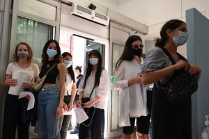 Students wait to receive a dose of the Pfizer/BioNTech Covid-19 vaccine at a vaccination centre at the Hunter Street Health Centre in London on June 5, 2021.