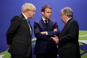 Boris Johnson in discussion with United Nations secretary-general Antonio Guterres (right) and France president Emmanuel Macron at COP26) in Glasgow.