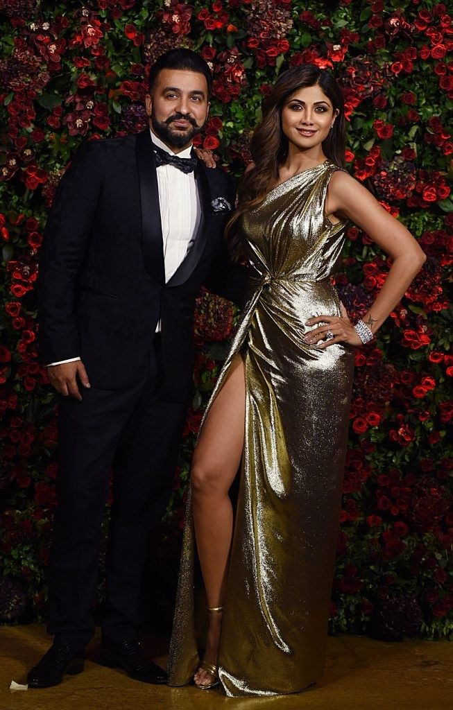 Shilpa Shetty poses for a picture with her husband Raj Kundra