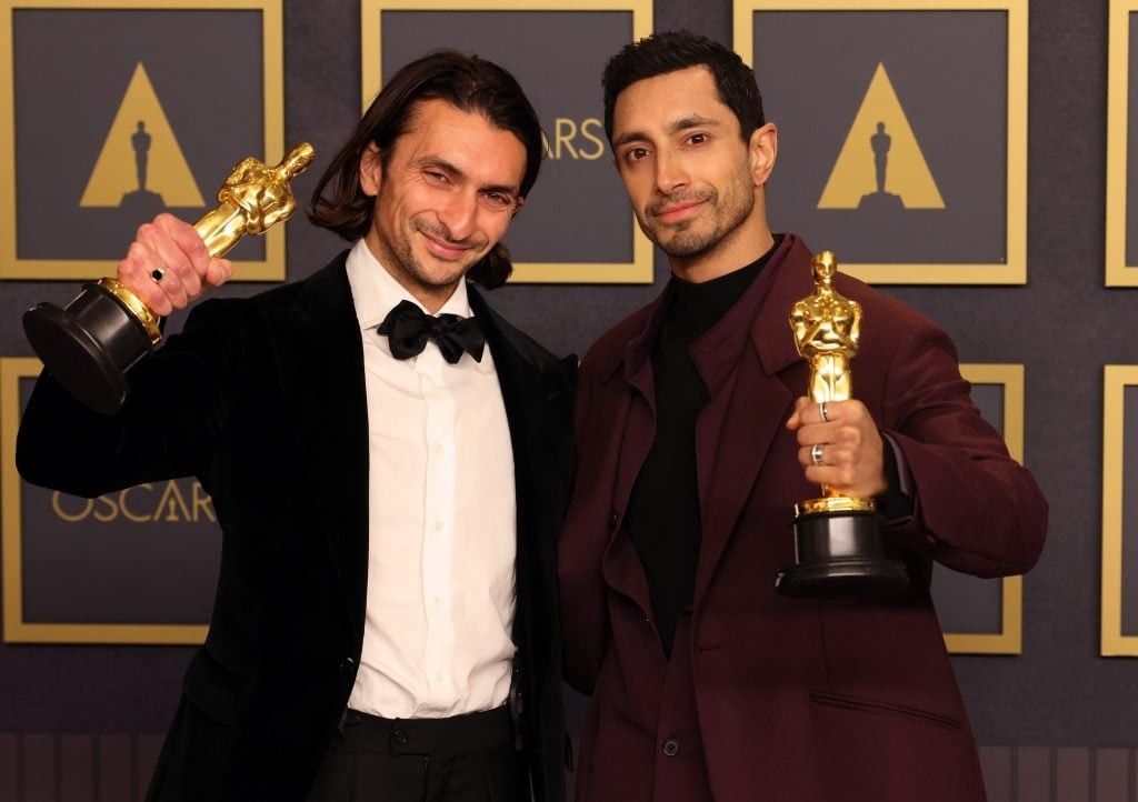 Riz Ahmed and Writer and Director Aneil Karia, winners of Best Live Action Short Film for The Long Goodbye pose in the press room at the 94th Annual Academy Awards