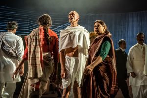 Paul Bazely (Mohandas Gandhi), Ayesha Dharker (Aai) and others in the paly