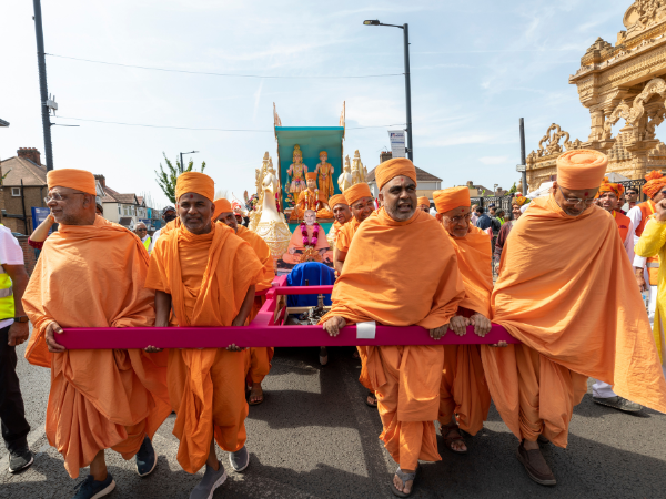 Swamis from Neasden Temple participate in the procession to commemorate the birth centenary of His Holiness Pramukh Swami Maharaj in London, the UK, on Sunday, July 17, 2022. (Picture: BAPS Swaminarayan Sanstha)