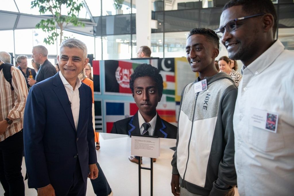 Sadiq Khan opens refugee week exhibition 1 Sadiq Khan speaks to participants in People Move. Credit Greater London Authority